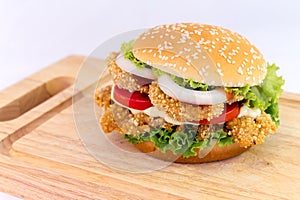 Chicken burger serve on Chopping Wood