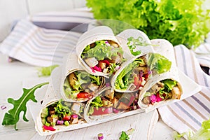 Chicken burrito. Healthy lunch. Mexican street food fajita tortilla wraps