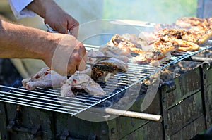 Chicken cooking on barbecue grill