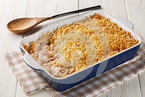 Chicken Cordon Bleu Casserole with chicken breast, chopped ham and Swiss cheese layered with creamy sauce and a buttery Panko