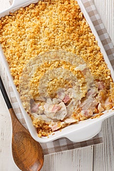 Chicken Cordon Bleu casserole with chicken, ham, and cheese baked in a light and creamy sauce topped with breadcrumbs close up in