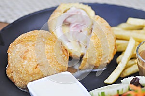 Chicken Cordon Bleu with French fries