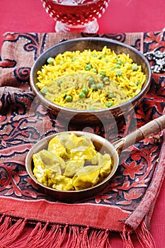 Chicken curry with basmati rice and green peas