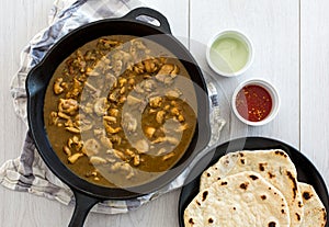 Chicken curry and naan photo