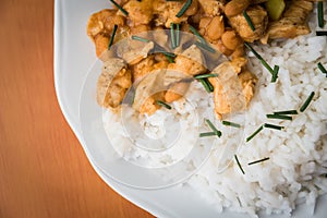 Chicken curry nuggets with rice and bean