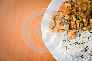Chicken curry nuggets with rice and bean