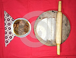 Chicken curry with ruti, traditional bengali lunch