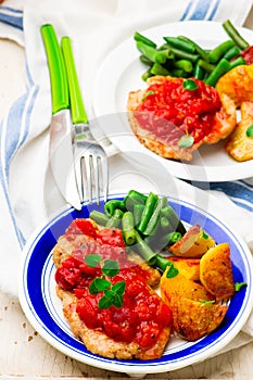 Chicken Cutlets in Pizzaiola Sauce.