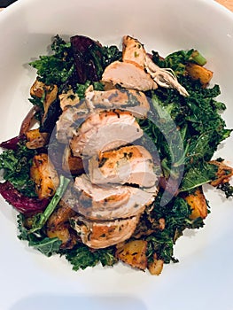 Chicken dinner with kale and root vegetables