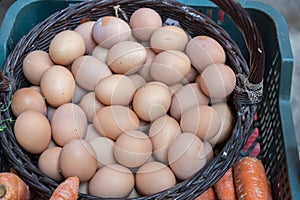 Chicken eggs in basket for sale at Porto market (Mercado do Bolhao