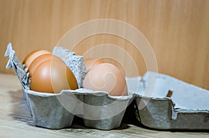 Chicken eggs in cardboard packing