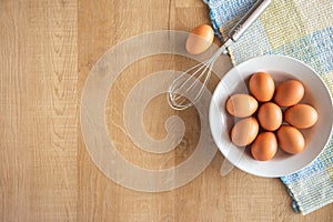 Chicken eggs and egg beater