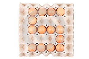 Chicken Eggs In paper container tray box arranged English alphabet is ` S ` or Number 5.
