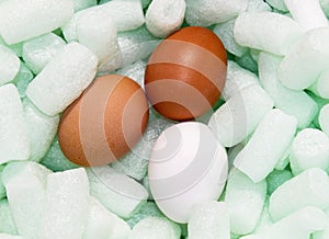 Chicken eggs are placed in the protective fillers for parcels. Packaging material