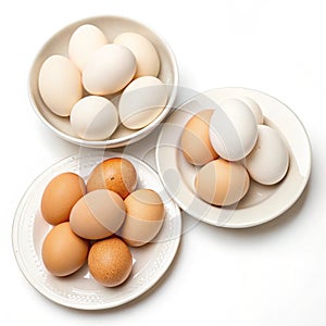 Chicken eggs in plates isolated on white background