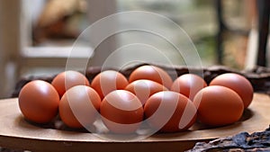 Chicken eggs on a wooden background