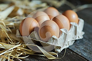 Chicken eggs on a wooden surface