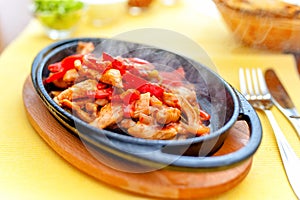 Chicken fajita smoking hot served on iron plate