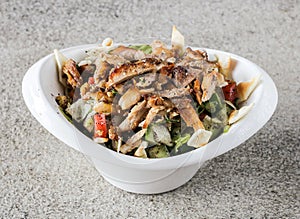 Chicken fattoush bil dajaj with cucumber and tomato served in dish isolated on background top view of Arabic fast food