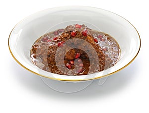 Chicken fesenjan, pomegranate walnut stew, iranian persian cuisine