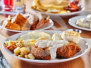 Chicken fried steak covered in gravy