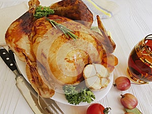 Chicken fried whole cooking rustic delicious traditional on a white wooden background