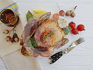 Chicken fried whole cooking rustic on a white wooden background