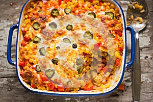 Chicken gyros bake with rice, corn, red pepper and gherkins