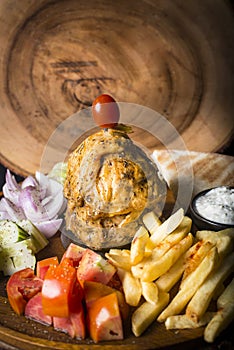 Chicken Gyros kebab served with bread,french fries and salad