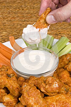 Chicken hot wings and dipping sauce photo