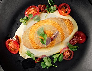 Chicken kiev cutlet with mashed potato