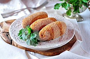 Chicken Kiev cutlets with parsley leaves. Ukrainian tradition food.