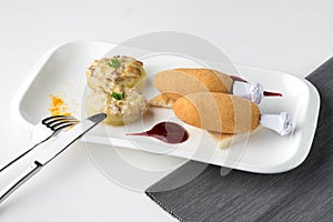 Chicken Kiev cutlets with potato, mushrooms and decoration