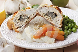 Chicken kiev with vegetables