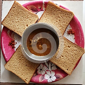 Chicken kolhapuri with bread for breakfast