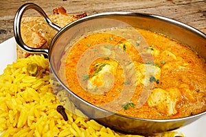 Chicken korma in balti dish with rice