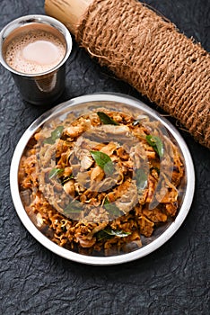 Chicken Kothu Parotta a popular South Indian street food in Kerala made with shredded Porotta