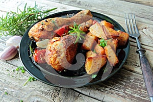 Chicken lega with potatoes chips photo