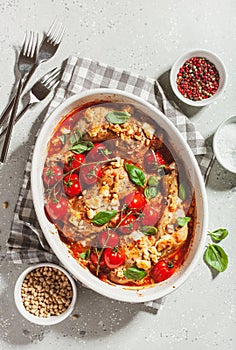 chicken legs backed with feta cheese tomatoes and pine nuts, healthy meal