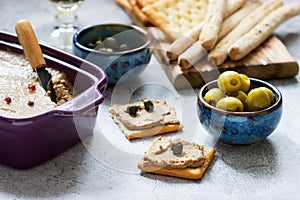 Chicken liver, onion and carrot paste, served with crackers, grissini, olives, capers and champagne