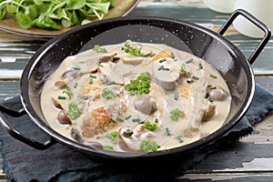Chicken meat with mushroom and cream cheese photo