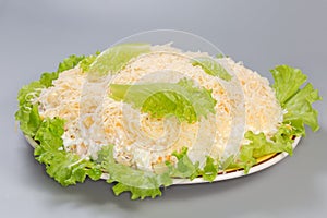 Chicken meat salad with canned pineapple and corn on lettuce