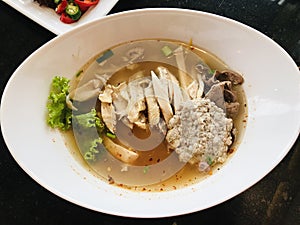 Chicken noodles soup with pork liver and minced pork.