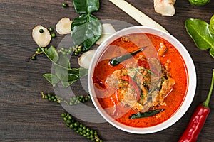 Chicken panang curry and ingredient spice on wooden background i