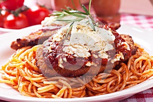 Chicken parmesan with spaghetti pasta photo