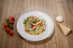 Chicken penne pasta with bread crums and veggies