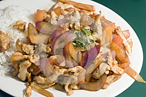 Chicken pollo saltado traditional Peruvian food photo