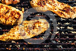 Chicken and pork steak grilled on a charcoal barbeque. Top view of camping tasty barbecue  food concept  food on grill and detail