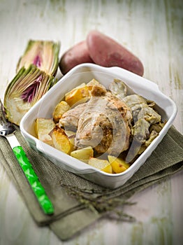 Chicken with potatoes and artichoke