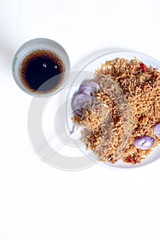 Chicken rice and coke or pepsi cool drink  isolated on a white background. overhead view